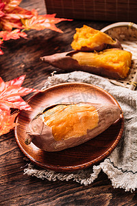 秋天冬季美食烤地瓜摄影图