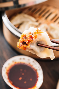 冬至节日摄影照片_美食辣椒油饺子摄影图