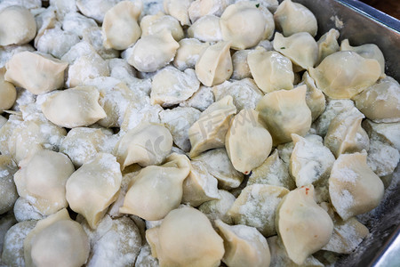 西安回民街羊肉水饺摄影图