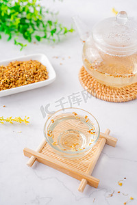 桂花乌龙茶茶叶摄影照片_桂花花茶摄影图