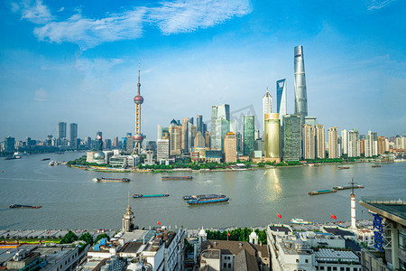 上海黄浦江两岸建筑风景摄影照片_航拍雄伟的黄埔江的两岸与船只摄影图