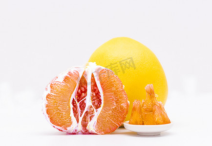 中药柚子摄影照片_秋季水果红心柚子摄影图