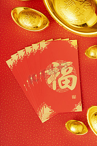 初二摄影照片_新年红包金元宝红色喜庆摄影图