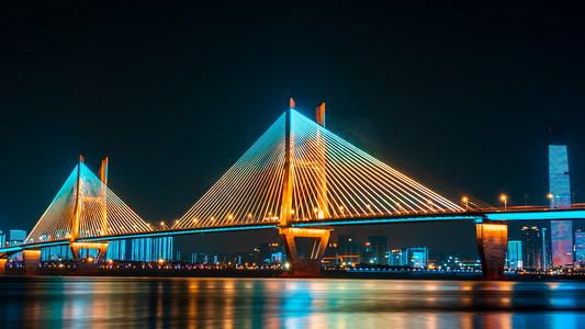 东莞城区夜景摄影照片_武汉城市建筑长江二桥夜景长曝光摄影图