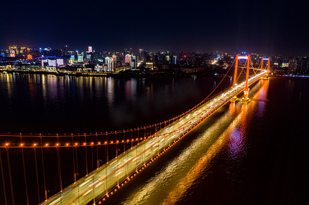 南京常泰长江大桥摄影照片_武汉城市建筑鹦鹉洲大桥夜景航拍摄影图