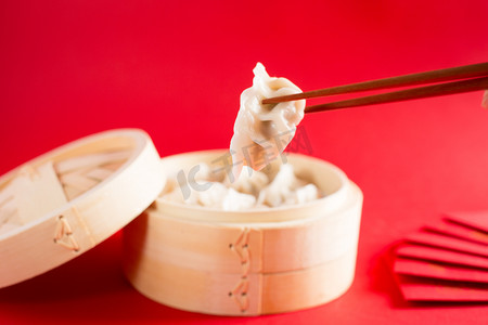 蒸饺蒸笼新春节日喜庆美食过年红包摄影图配图