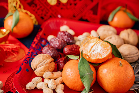 新年 过年坚果年货橘子食品静物摆拍摄影图配图