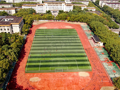 贵州民族大学中午体育场运动航拍摄影图配图