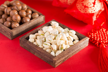 过年坚果美食中国结瓜子花生红色摄影图配图
