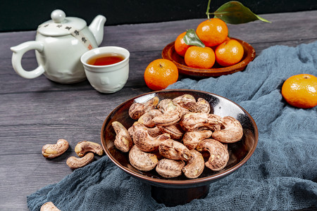 年货摄影照片_烘焙炭烧虎皮腰果食品美食摄影图配图