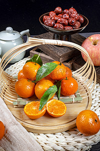 一提篮新鲜多汁小橘子美味食材摄影图配图