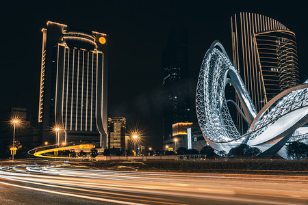 星河补习摄影照片_武汉城市建筑夜晚车流光绘光谷广场长曝光摄影图配图