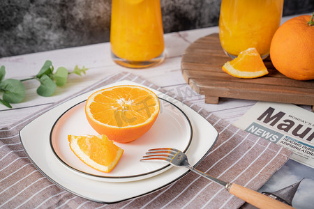 果汁橙摄影照片_果汁橙汁水果橙子健康营养食品饮品摄影图配图