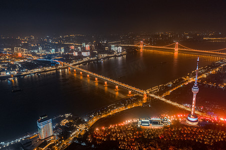 鹦鹉洲摄影照片_武汉城市建筑夜晚长江大桥龟山航拍摄影图配图