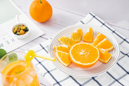 轮播海报小清新摄影照片_橙子水果新鲜脐橙食品摄影图配图