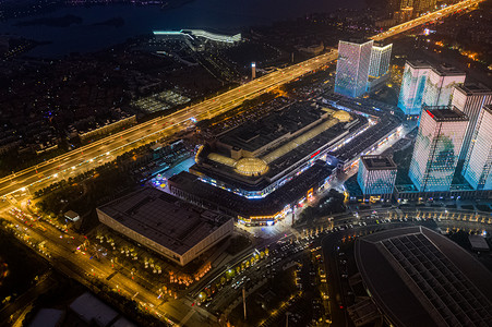 万达商城餐馆摄影照片_武汉城市建筑夜晚建筑经开万达广场航拍俯视摄影图配图