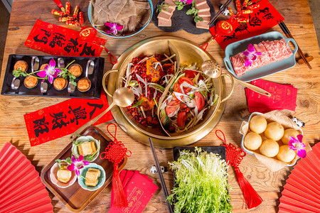 中国风餐饮摄影照片_年夜饭蔬菜红油美食餐饮美食摄影图配图