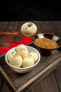 桂花甜品摄影照片_传统中式小吃大黄米汤圆桂花芝麻食材摄影图配图