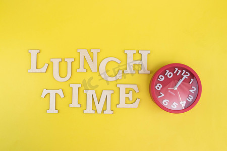 用餐时间午餐钟表餐厅用餐提示摄影图配图