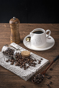 咖啡美食饮料咖啡豆桌子摆放摄影图配图