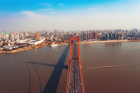 蓝天航拍摄影照片_武汉城市建筑晴天桥鹦鹉洲大桥航拍摄影图配图