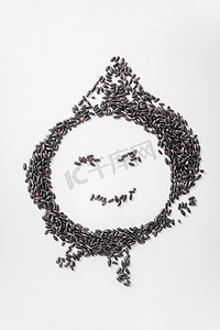 黑米食材创意笑脸图案摄影图配图