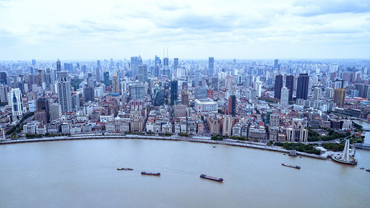 环保宣传册设计摄影照片_城市建筑上午建筑鸟瞰图素材摄影图配图