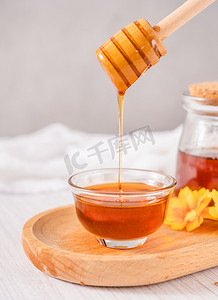 美食摄影照片_营养养生蜂蜜蜜糖食品摄影图配图