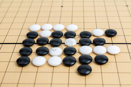 围棋棚拍黑白棋局室内摆拍摄影图配图