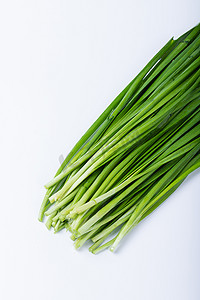 绿色蔬菜割韭菜饮食食材摄影图配图