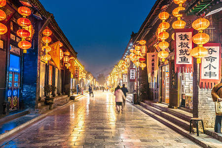 手绘扇子图片摄影照片_山西平遥古城夜晚平遥古城夜景室外街道红灯笼摄影图配图