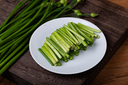 蔬菜绿色韭菜健康韭苔摄影图配图