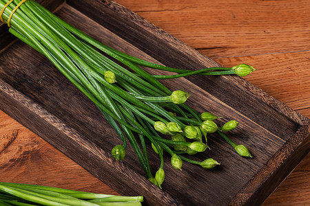 绿色蔬菜韭苔韭菜花食材摄影图配图