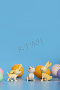 节日海报蓝色摄影照片_复活节西方节日兔子彩蛋蓝色静物摄影图配图