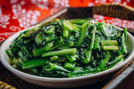 中式食物摄影照片_油麦菜春季美食中式传统爆炒青菜摄影图配图