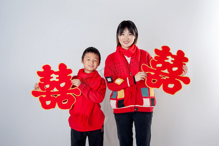 春节拜年高清摄影照片_新年喜庆红色高清亲子图