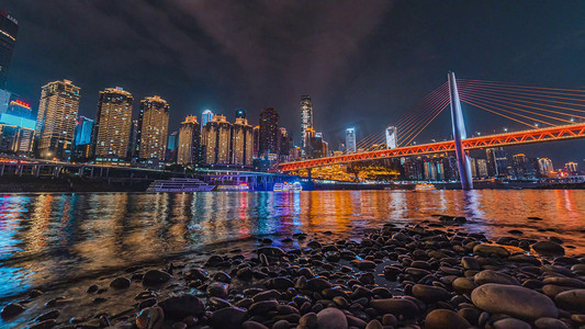 8摄影照片_8k重庆网红地标洪崖洞江边大桥日转夜延时
