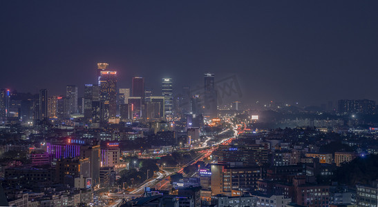 城市摄影照片_城市CBD夜景晚上建筑群楼顶长曝光摄影图配图