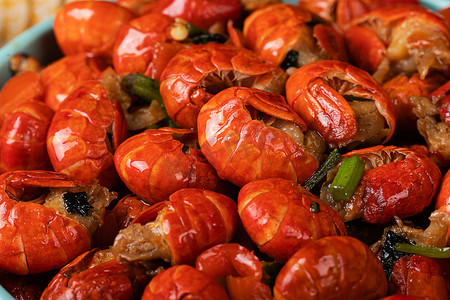 龙虾美食摄影照片_香辣小龙虾虾尾特写食材摄影图配图