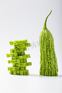 果蔬果实凉瓜绿色蔬菜下火摄影图配图