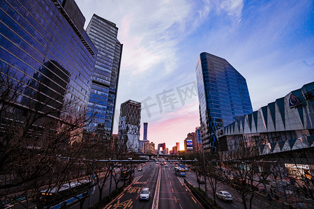 新型产业摄影照片_北京地标傍晚国贸CBD建筑群户外地标夜景打卡摄影图配图