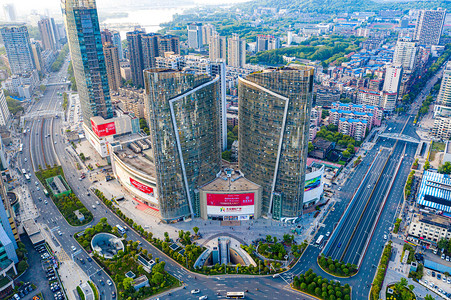 圈光摄影照片_武汉城市建筑晴天建筑光谷国际广场航拍摄影图配图