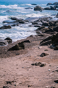 海边黄昏大海沙滩游玩摄影图配图