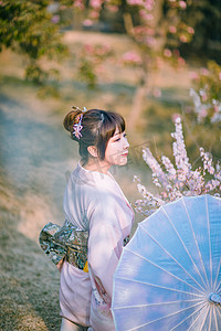 文艺日系人像白天和服少女户外海棠花树下撑伞抬头摄影图配图美女