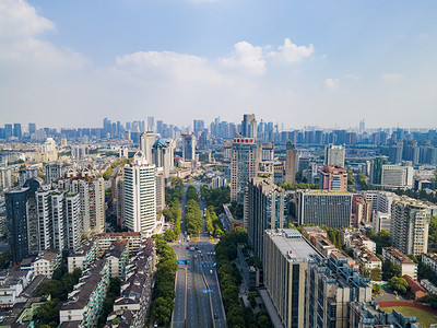 风铃大道摄影照片_航拍杭州城市高楼发展摄影图配图