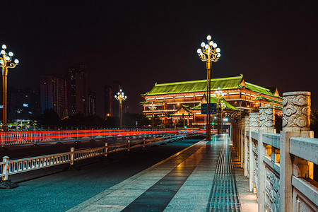 南昌地标摄影照片_南昌城市地标夜晚地标南昌市图书馆光绘摄影图配图