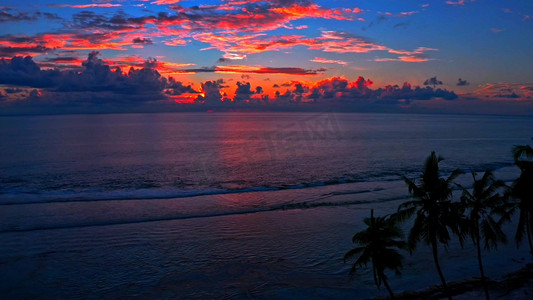 大海黄昏摄影照片_蜈支洲岛唯美海边落日无人机航拍实拍
