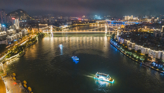 红光图摄影照片_城市夜晚柳州红光大桥夜景空中无人机摄影图配图