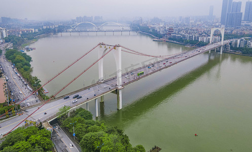 柳州红光大桥摄影照片_城市清晨红光大桥河畔航拍摄影图配图