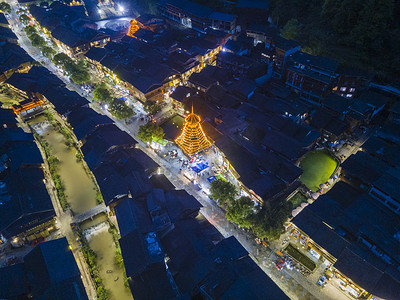 贵州城市摄影照片_城市夜晚肇兴侗寨航拍风光空中无人机摄影图配图